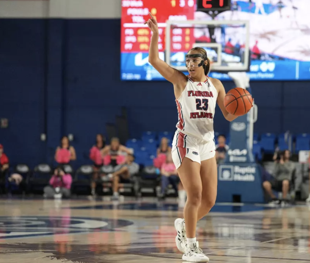 Guard Jada Moore with the ball last season against the University of North Texas on Feb. 14, 2024. 